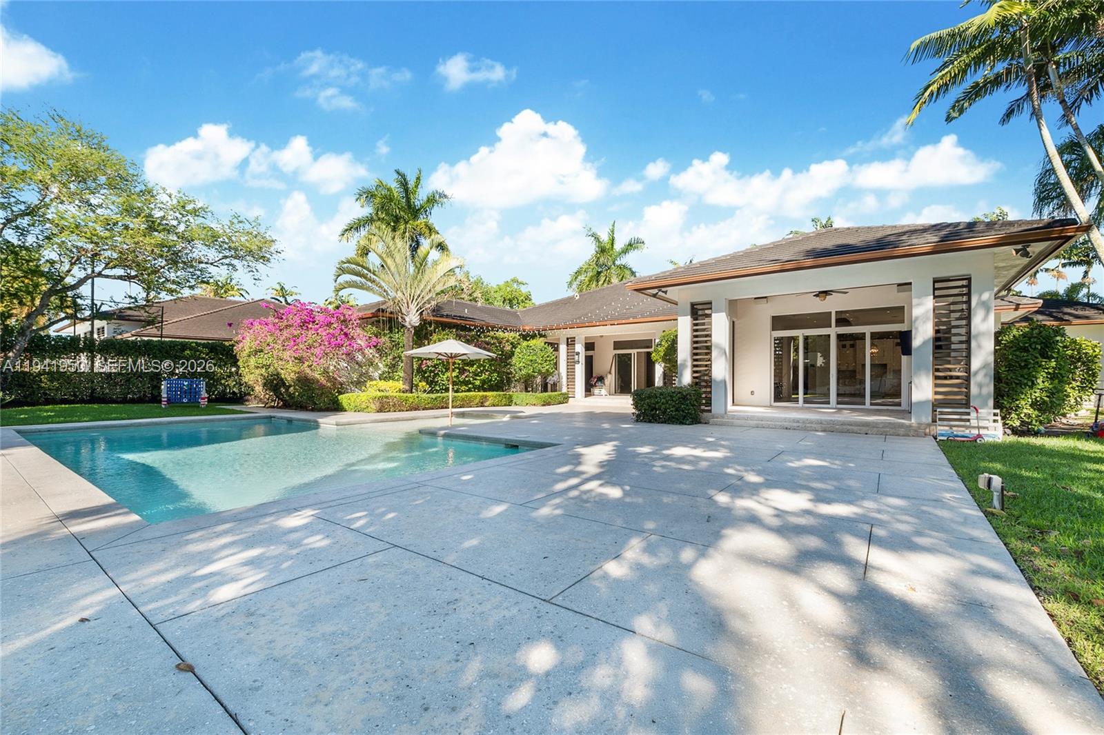 6880 Southwest 82nd Avenue Miami, FL 33143 - Photo 27 of 29 a view of a house with a yard