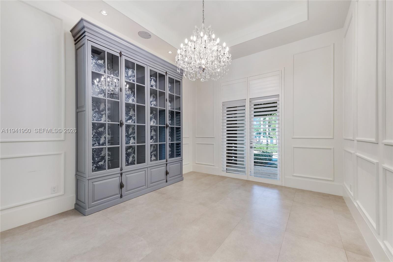 6880 Southwest 82nd Avenue Miami, FL 33143 - Photo 5 of 29 a view of an empty room with a window