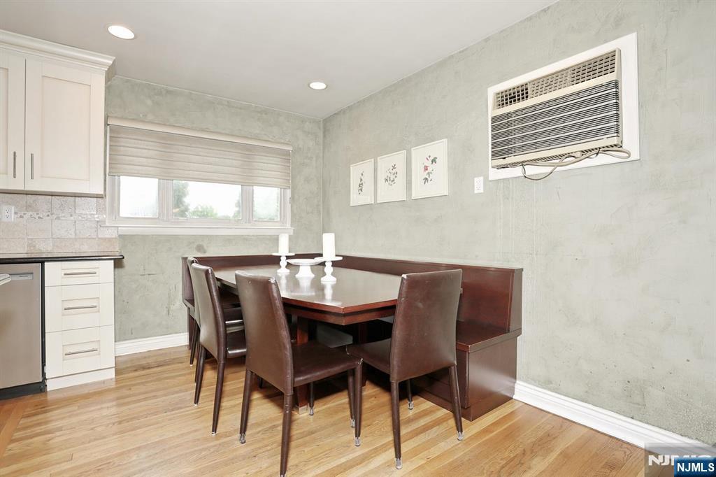 87 Barbara Road Dumont, NJ 07628 - Photo 13 of 48 a view of a dining room with furniture and wooden floor
