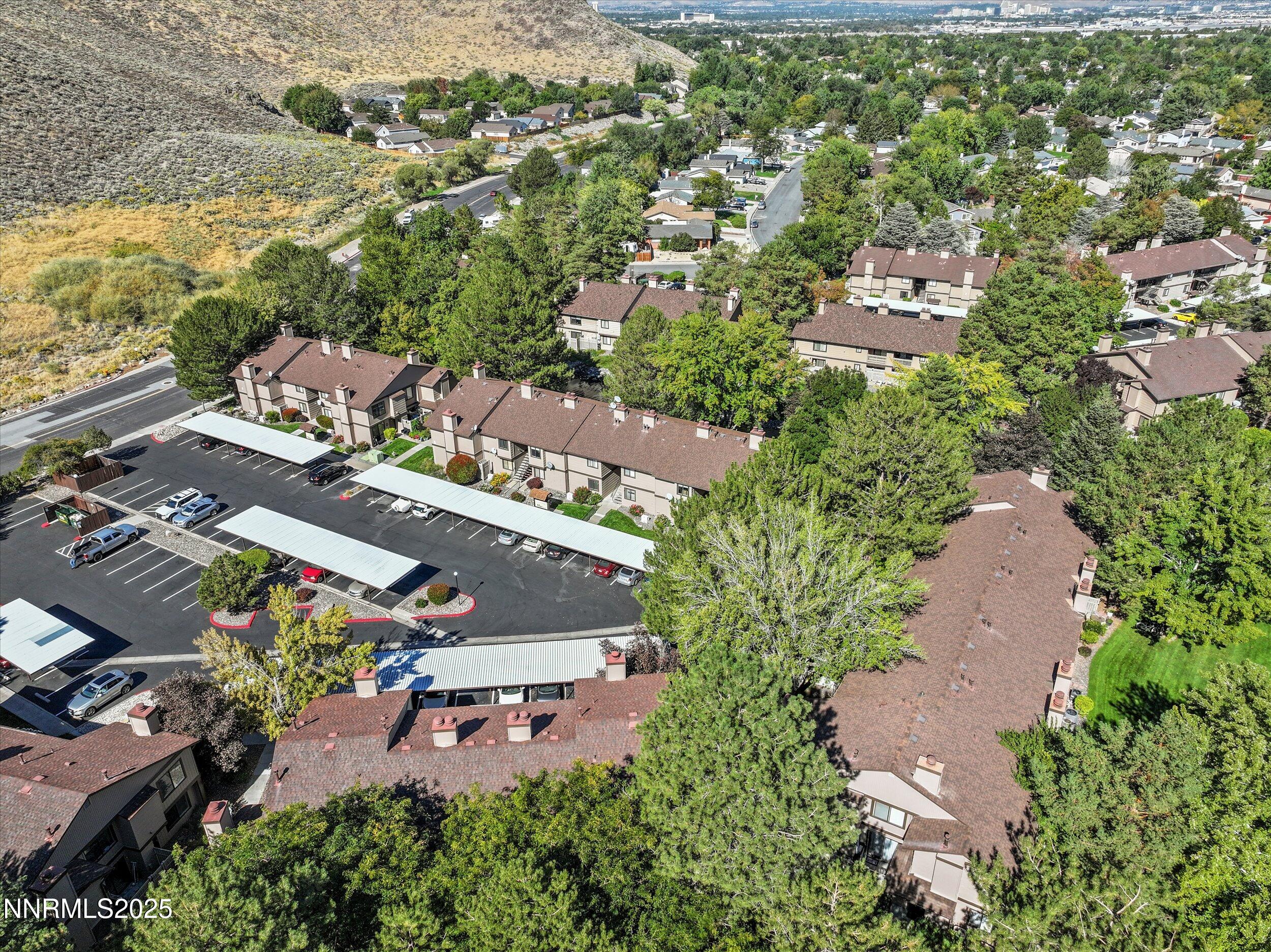 4634 Rio Poco Road Reno, NV 89502 - Photo 20 of 24 an aerial view of a city with lots of residential buildings