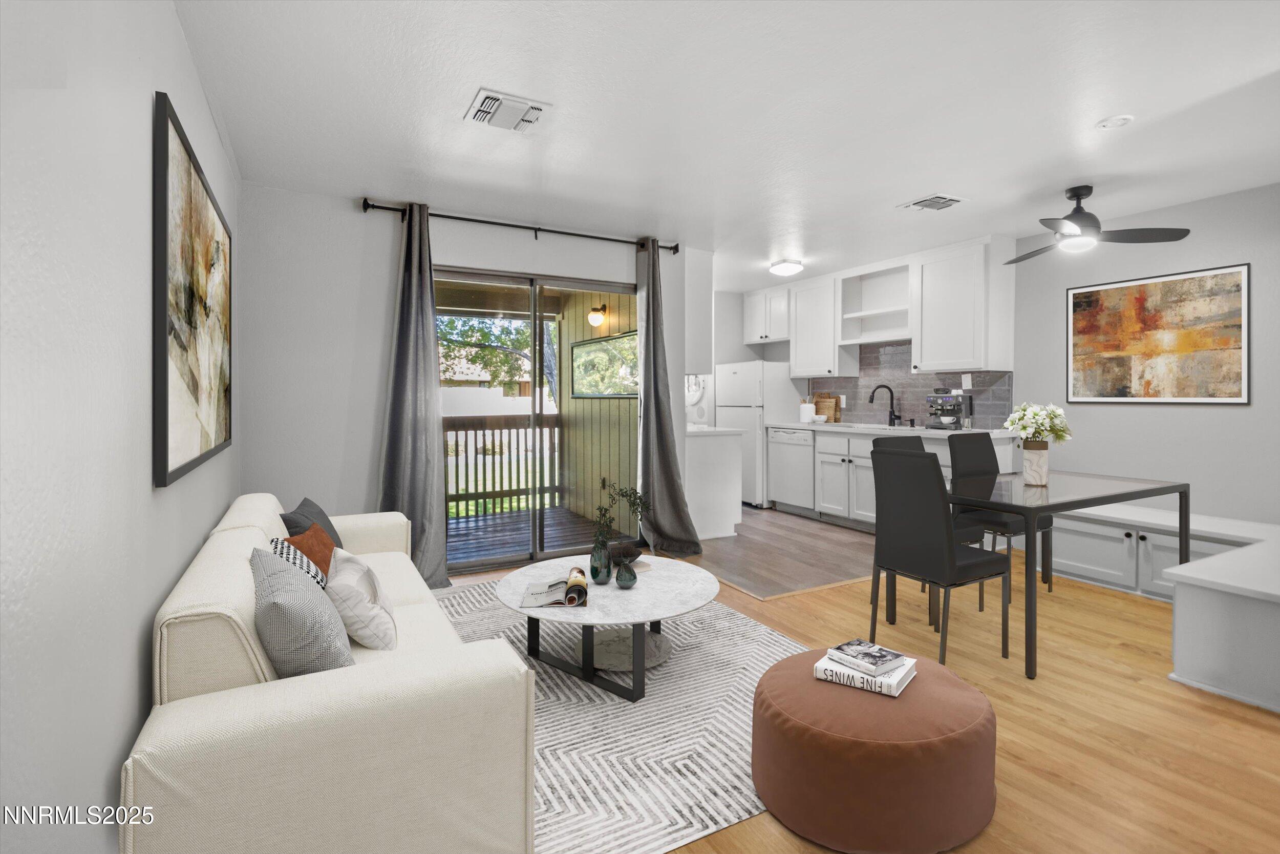 4634 Rio Poco Road Reno, NV 89502 - Photo 4 of 24 a living room with furniture and wooden floor