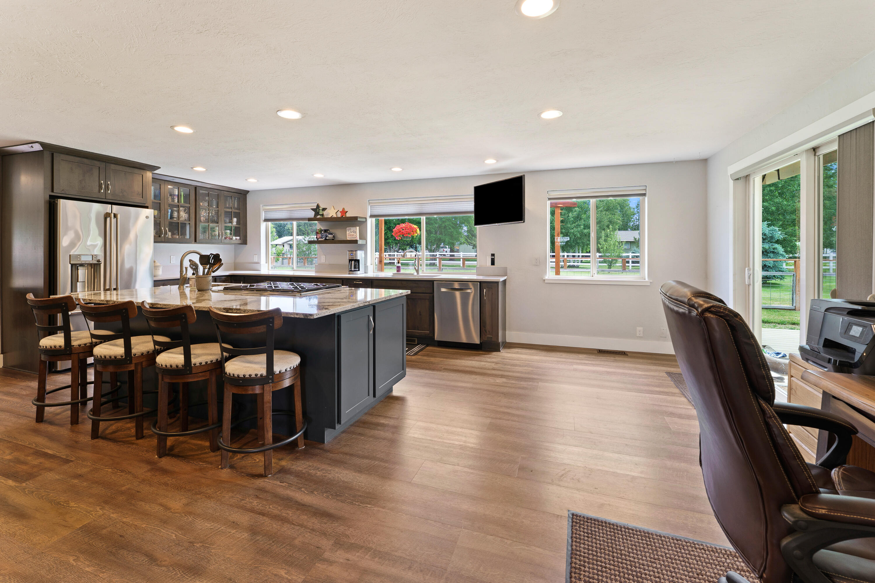 21697 Old Red Road Bend, OR 97702 - Photo 11 of 50 Remodeled kitchen with massive island, perfect for entertaining.
