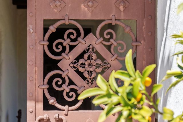 a kitchen with stainless steel appliances kitchen island granite countertop a stove and a refrigerator