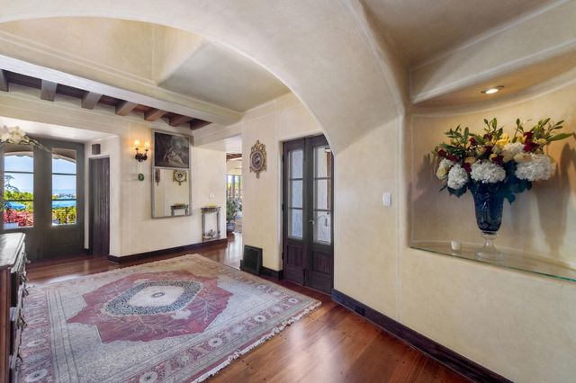 a bedroom with a bed and a fireplace