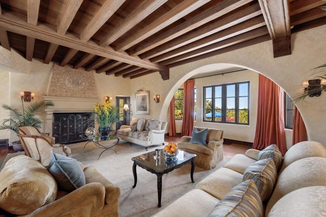 a bathroom with a sink a mirror and shower