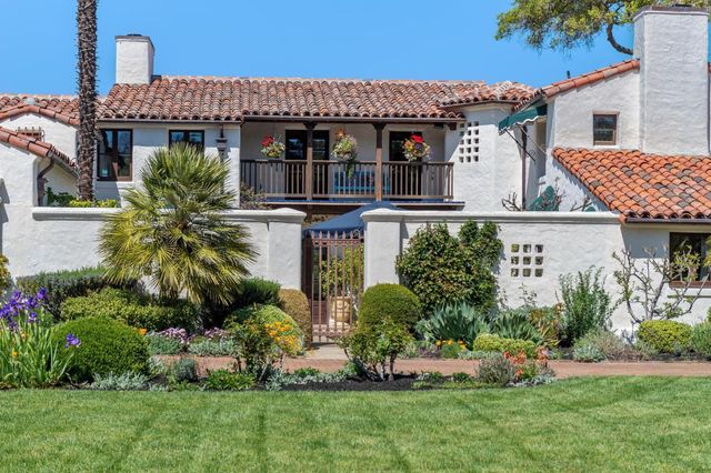 a view of a chairs and tables in the patio