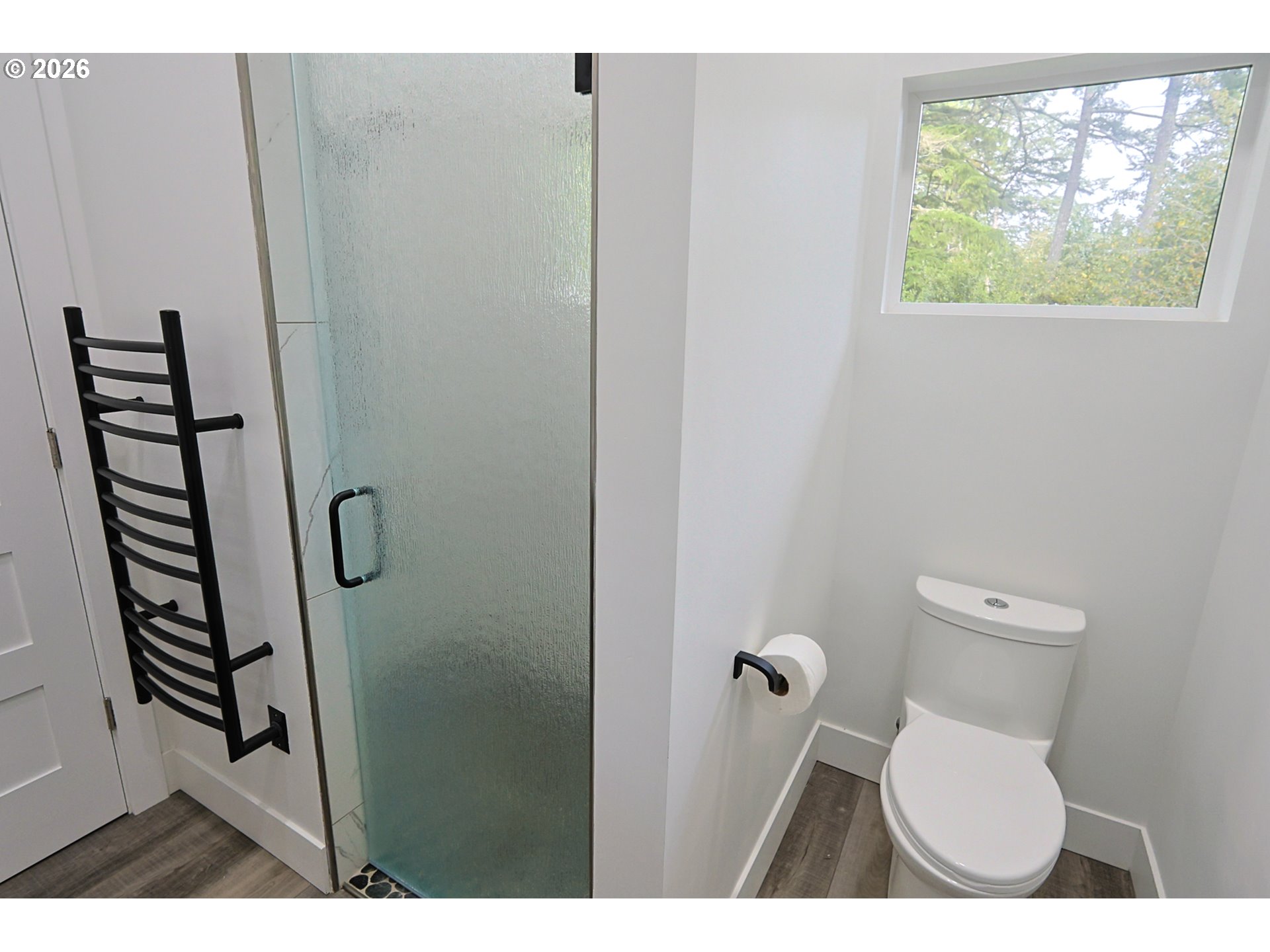 59492 Seven Devils Road Bandon, OR 97411 - Photo 40 of 48 a bathroom with a toilet and a shower