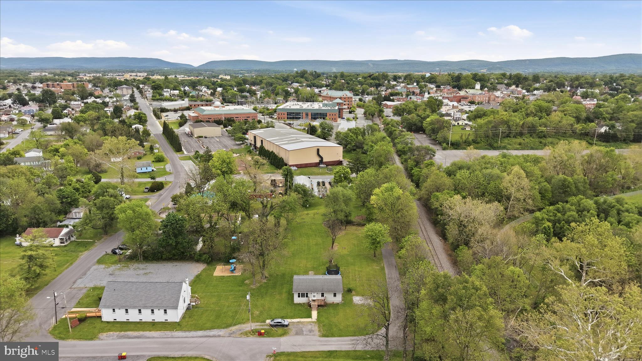 415 McDonald Street Ranson, WV 25438 - Photo 13 of 16 an aerial view of residential house with outdoor space and trees