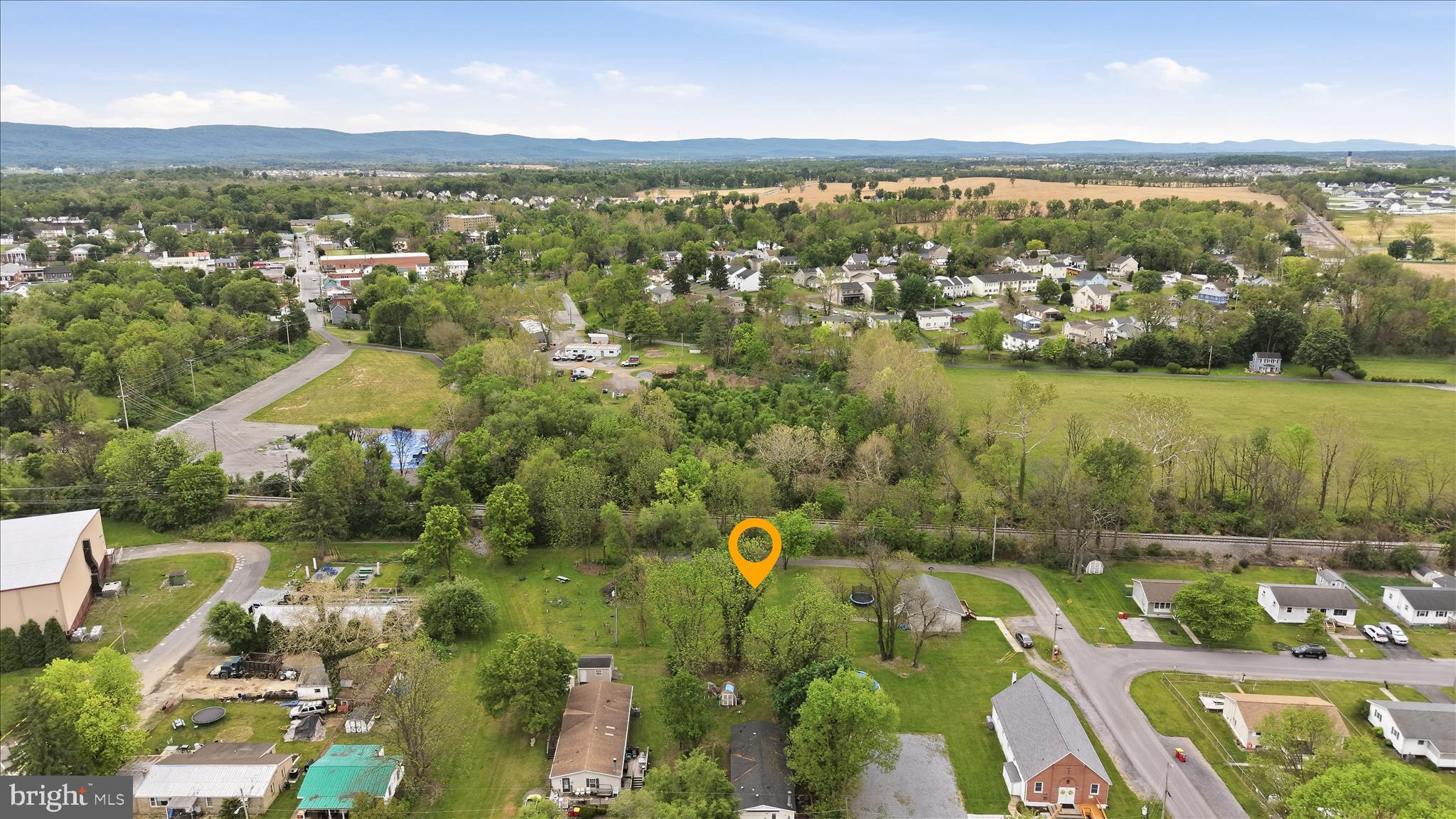 415 McDonald Street Ranson, WV 25438 - Photo 7 of 16 an aerial view of residential houses with outdoor space and river