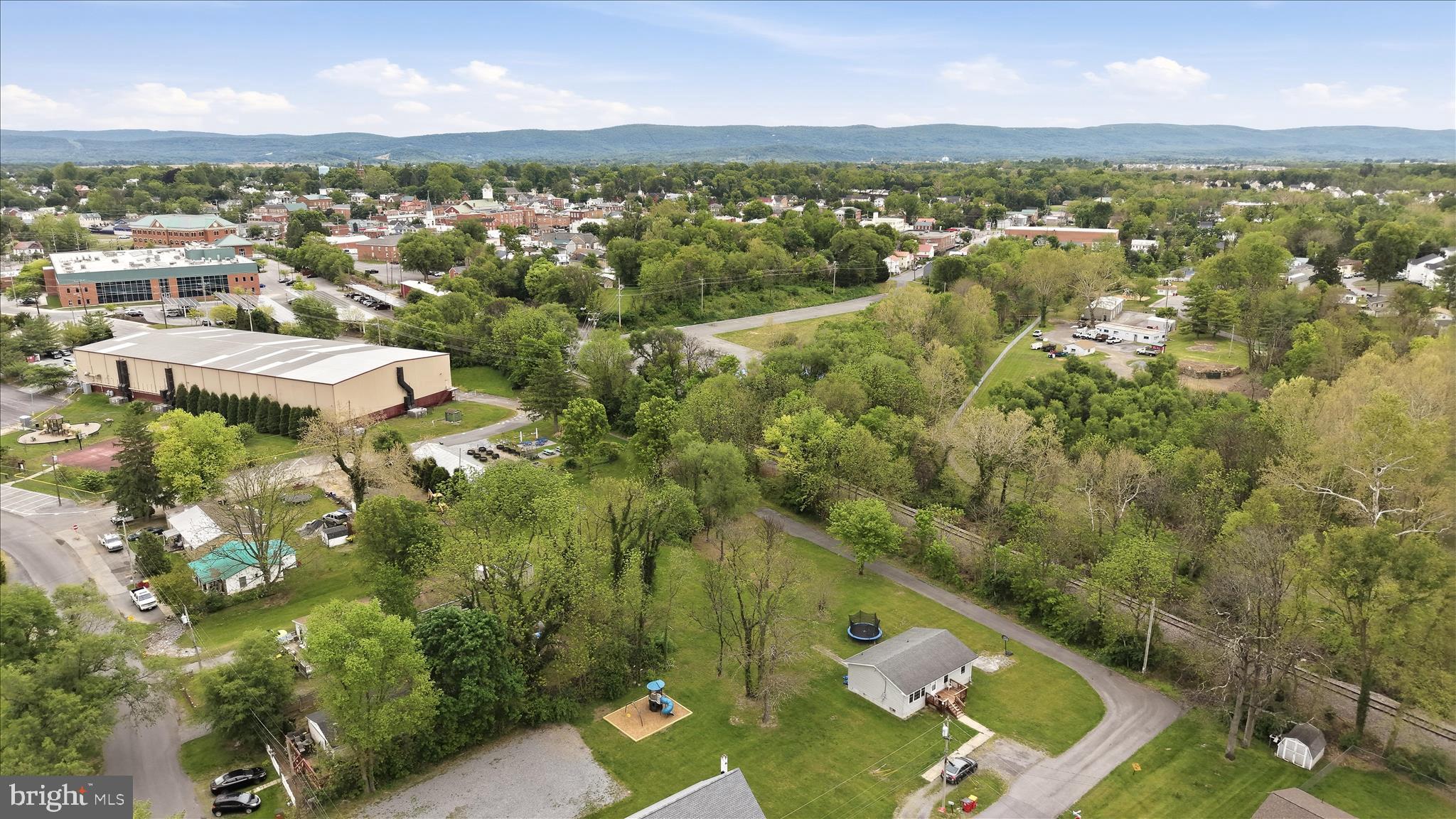 415 McDonald Street Ranson, WV 25438 - Photo 10 of 16 an aerial view of residential houses with outdoor space