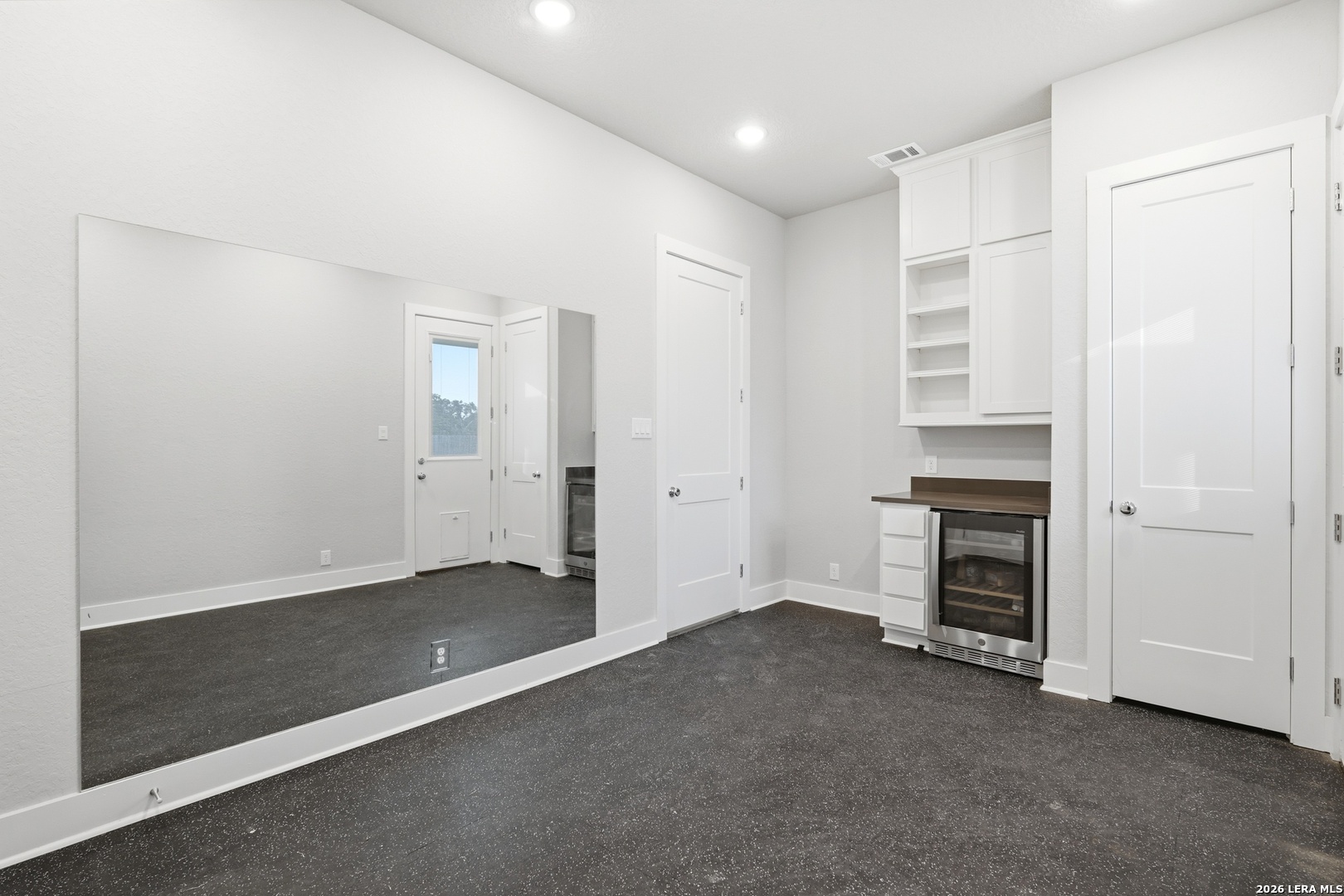 3018 Daplyn Bulverde, TX 78163 - Photo 19 of 36 an empty room with a fireplace and natural light