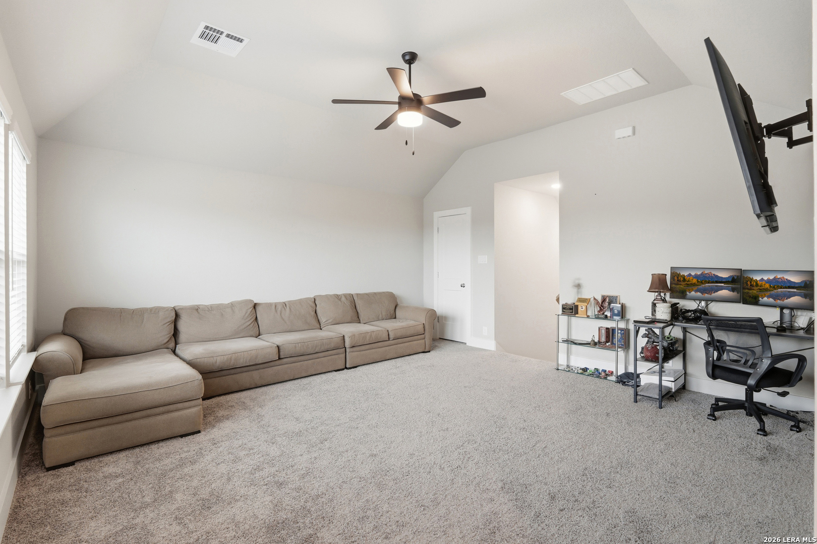 3018 Daplyn Bulverde, TX 78163 - Photo 24 of 36 a living room with furniture and a ceiling fan