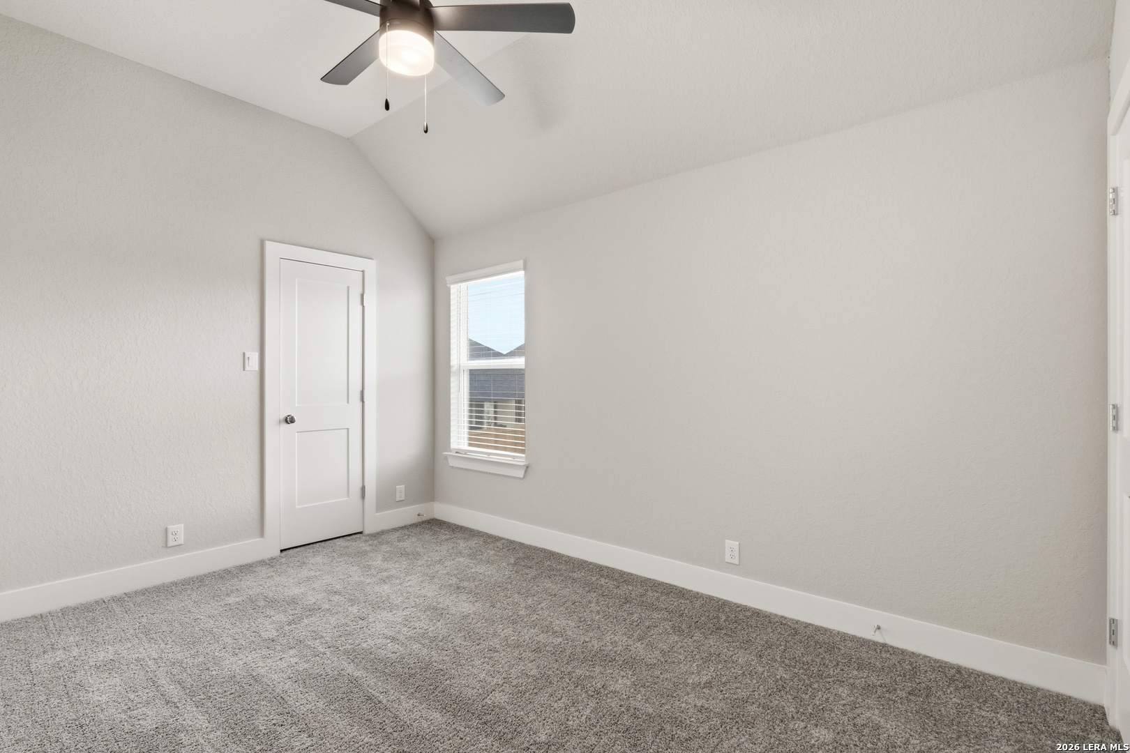 3018 Daplyn Bulverde, TX 78163 - Photo 26 of 36 an empty room with a ceiling fan and window