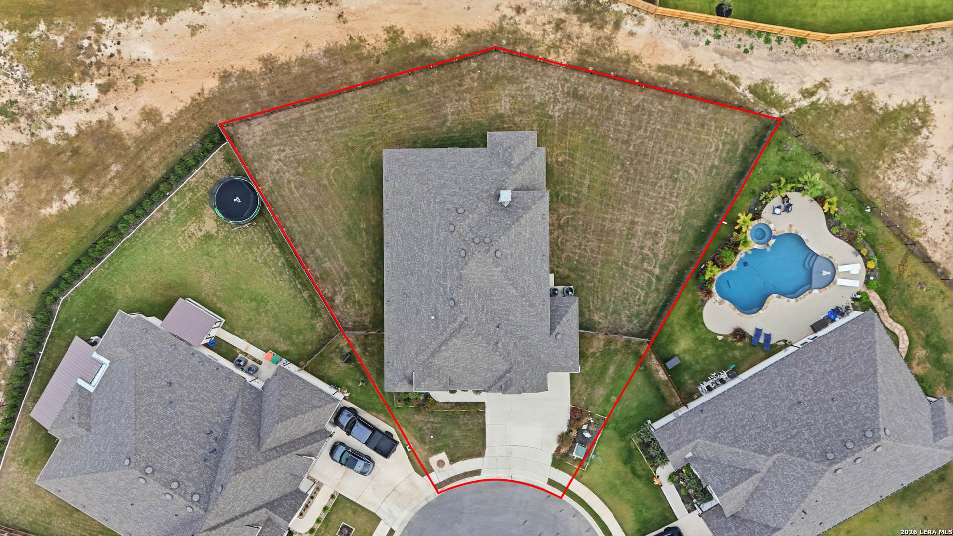 3018 Daplyn Bulverde, TX 78163 - Photo 31 of 36 an aerial view of a house with a yard and sitting area