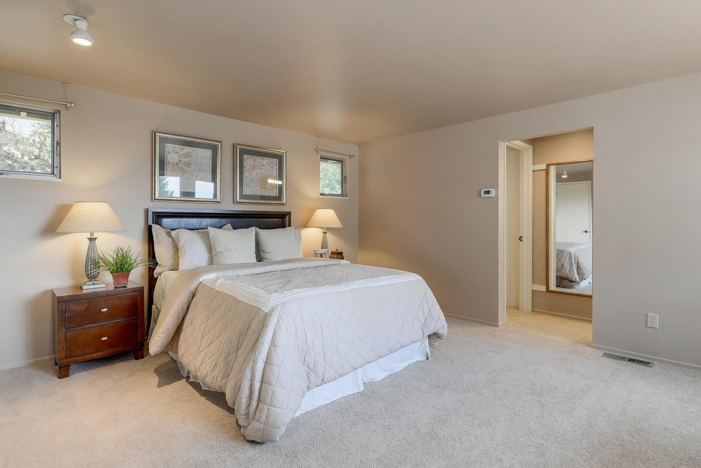 20143 Beatty Ridge Road Los Gatos, CA 95033 - Photo 10 of 21 a bedroom with a bed and window