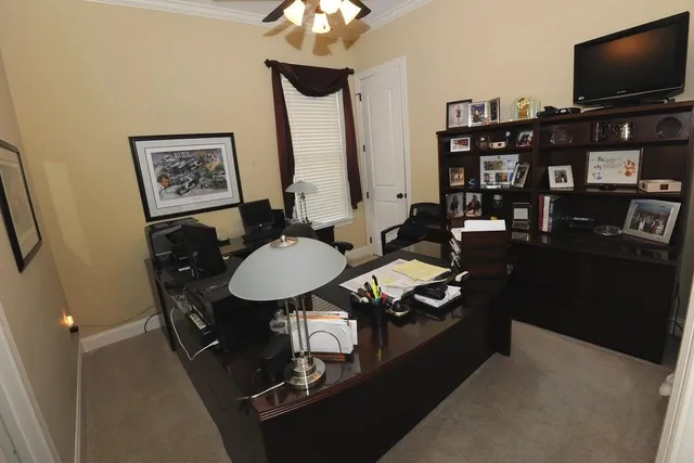 walk in closet with wooden floor