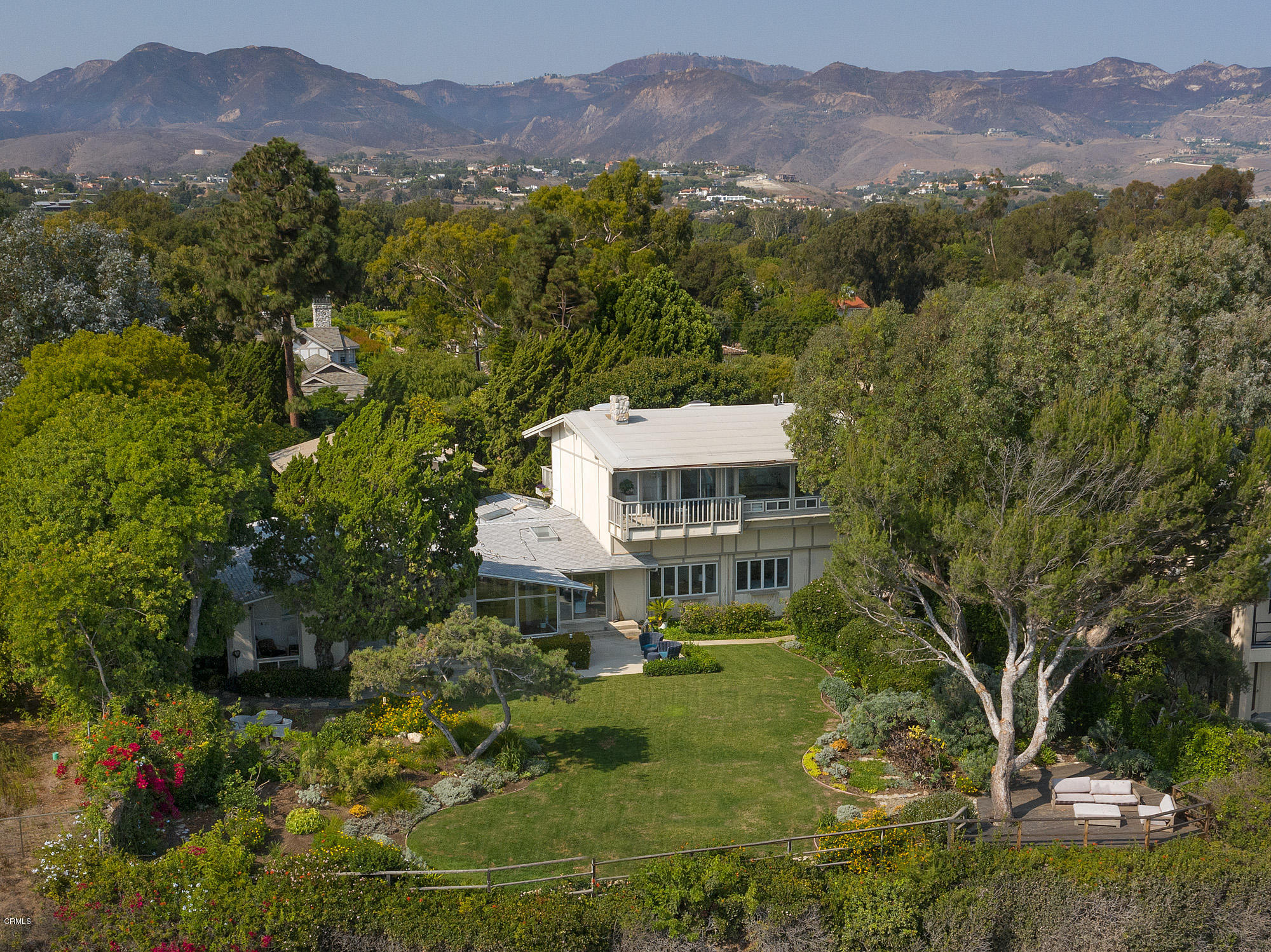 28946 Cliffside Drive Malibu, CA 90265 - Photo 2 of 29 a view of a town with mountains in the background