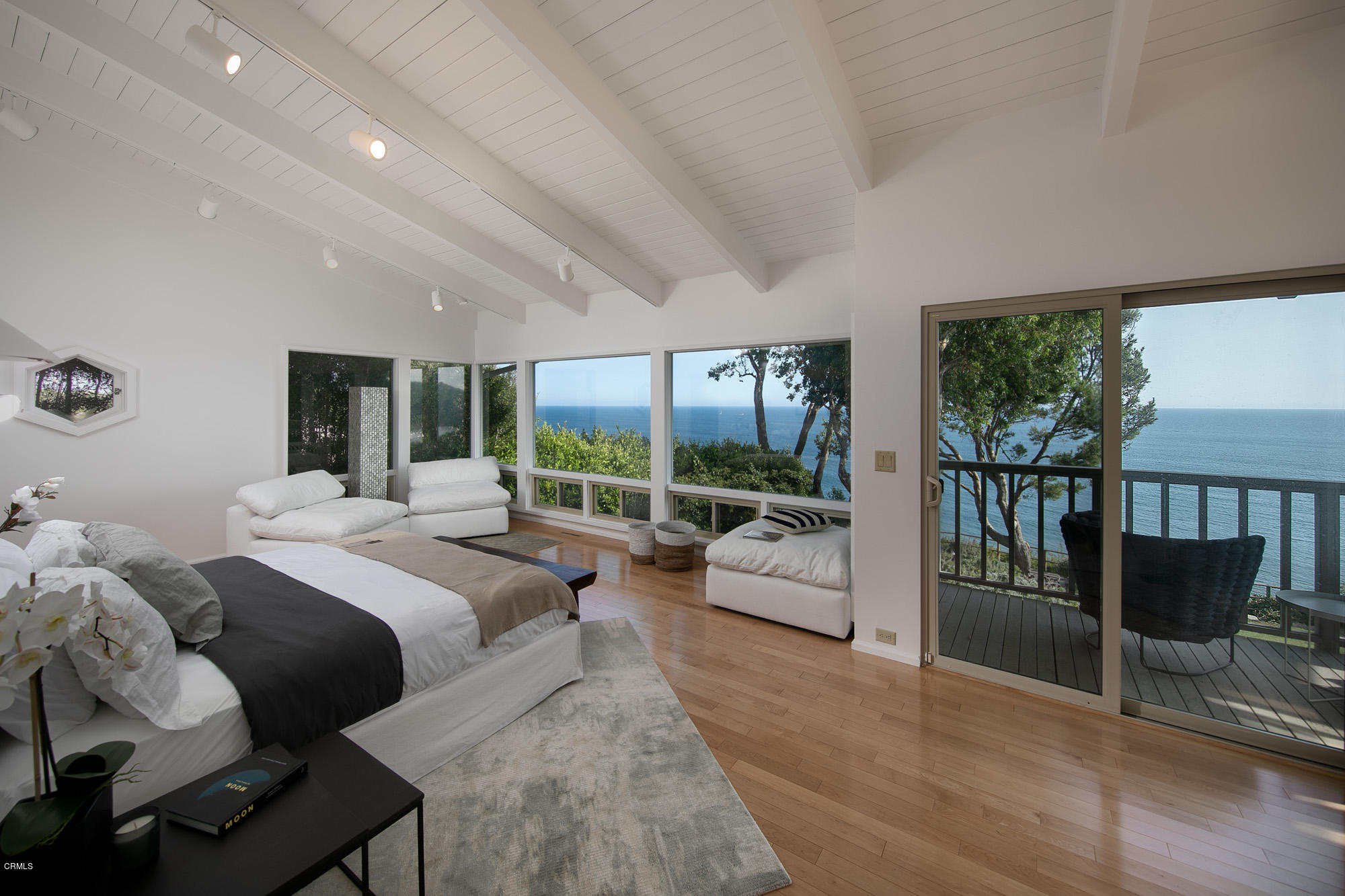 28946 Cliffside Drive Malibu, CA 90265 - Photo 14 of 29 a bed room with a bed and a large window