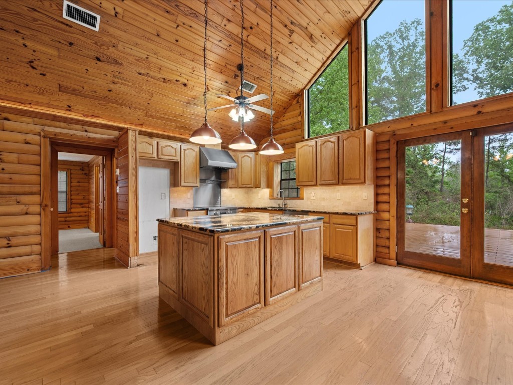 12868 Levi Road Willis, TX 77378 - Photo 11 of 41 The spacious living area flows seamlessly into the kitchen and dining spaces, making it ideal for both everyday living and entertaining.