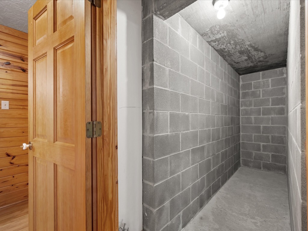 12868 Levi Road Willis, TX 77378 - Photo 15 of 41 Unique in-home storm shelter/pantry offering added safety and convenient storage space.