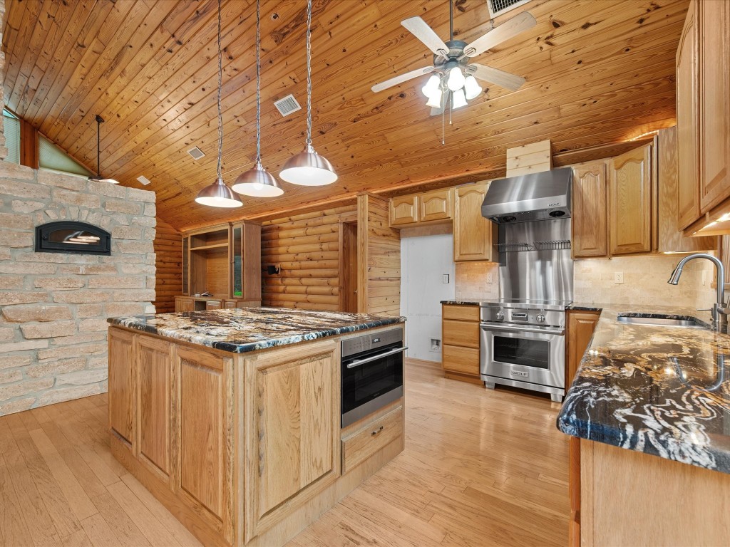 12868 Levi Road Willis, TX 77378 - Photo 4 of 41 Beautifully appointed kitchen with granite countertops
