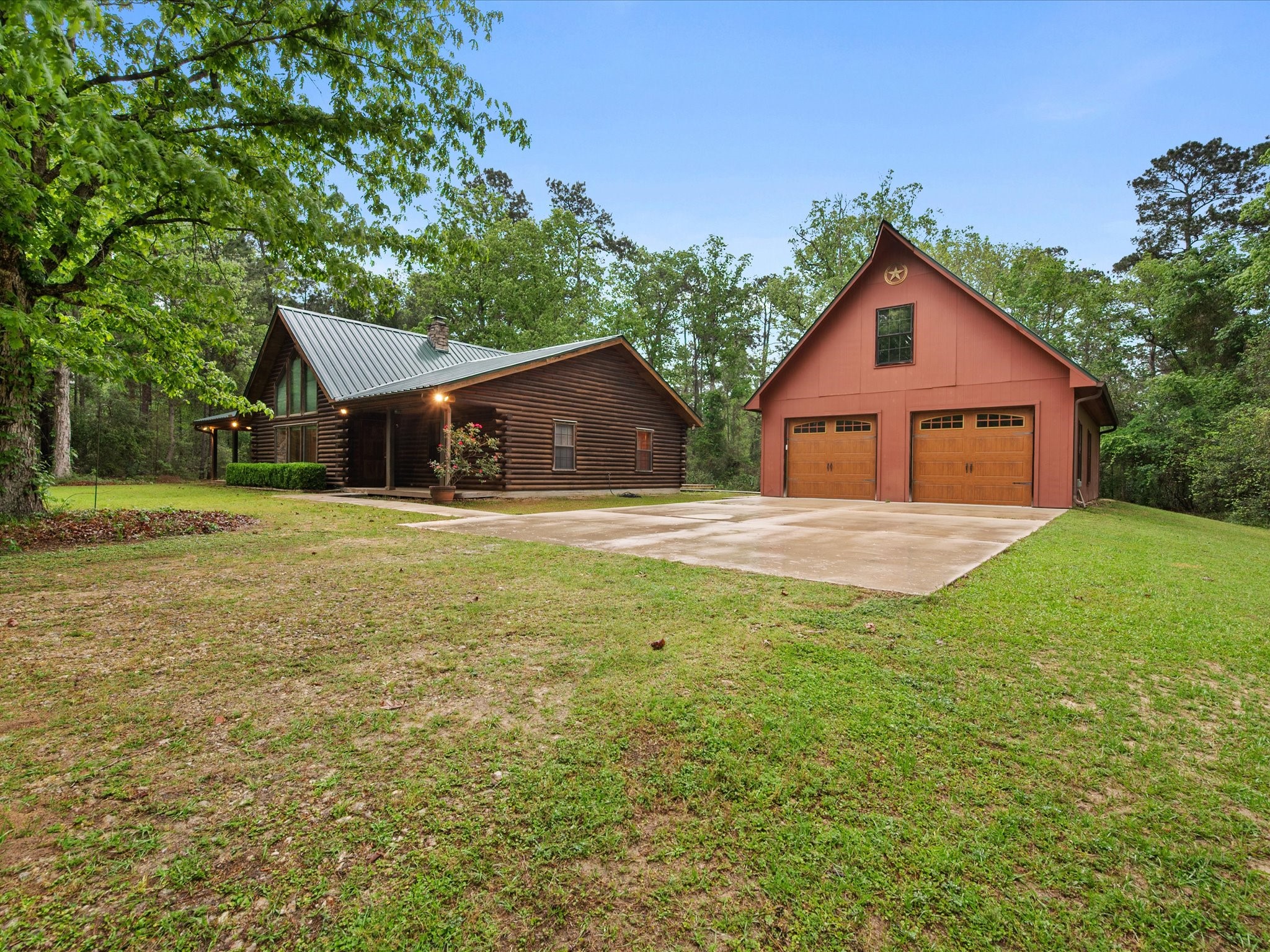 12868 Levi Road Willis, TX 77378 - Photo 41 of 41 Peaceful country living on 10 acres with a charming log home, detached garage, and room to roam.