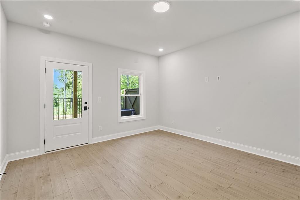 5715 Broad River View, Unit 449 Peachtree Corners, GA 30092 - Photo 17 of 29 an empty room with windows