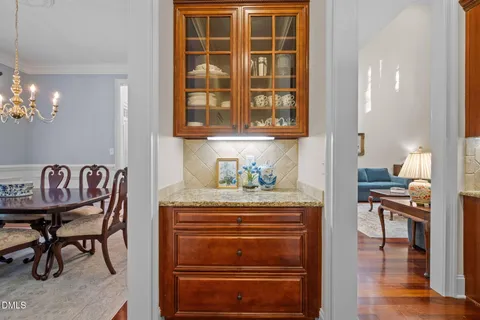 a view of dining room and wooden floor