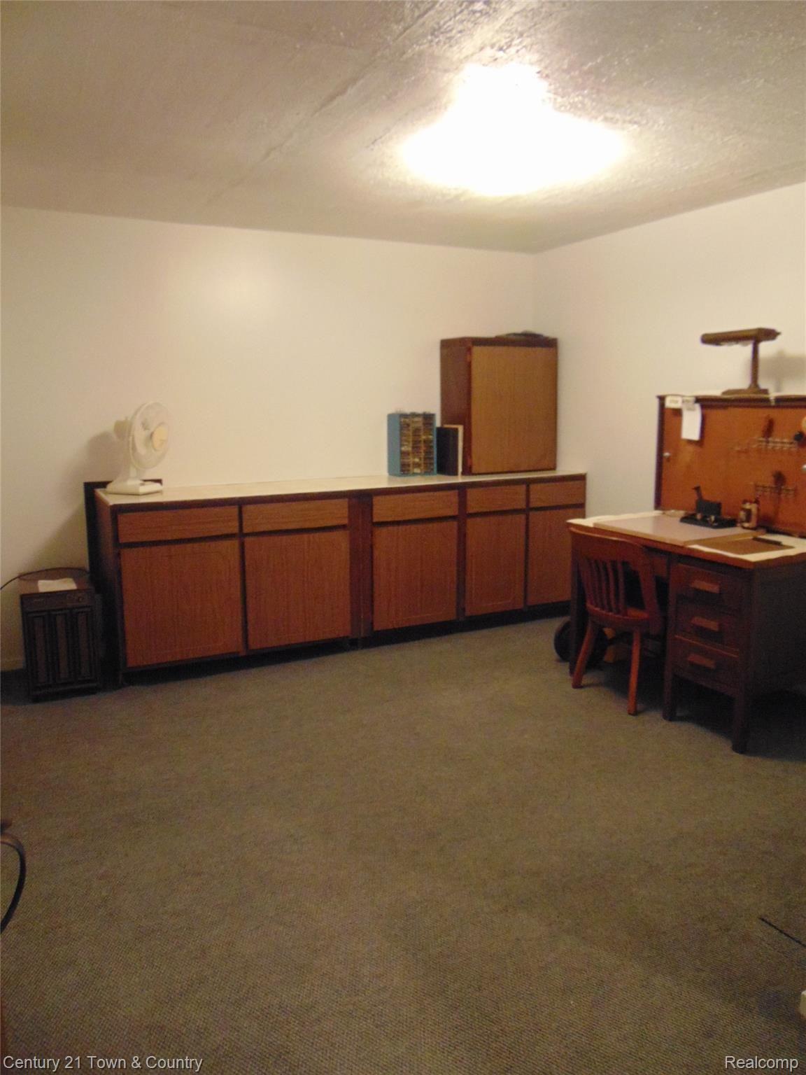 9555 Ridge Top Trail Clarkston, MI 48348 - Photo 33 of 49 Finished Workshop area in the Lower Level.....