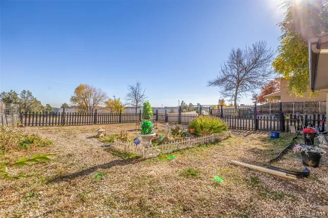 a view of a road with a building in the background