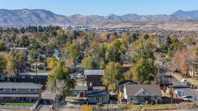 an aerial view of residential houses and outdoor space