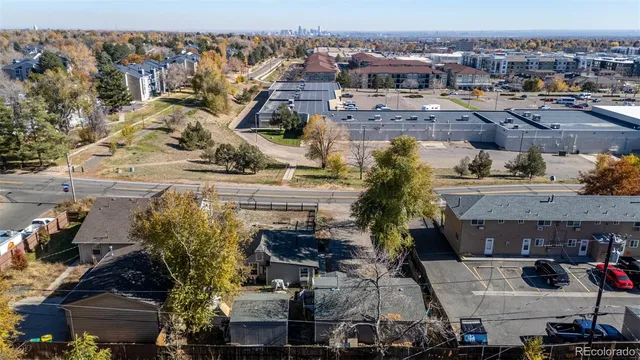 a view of a city with mountains in the background
