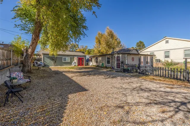 a picture of a room with a white wall and a picture