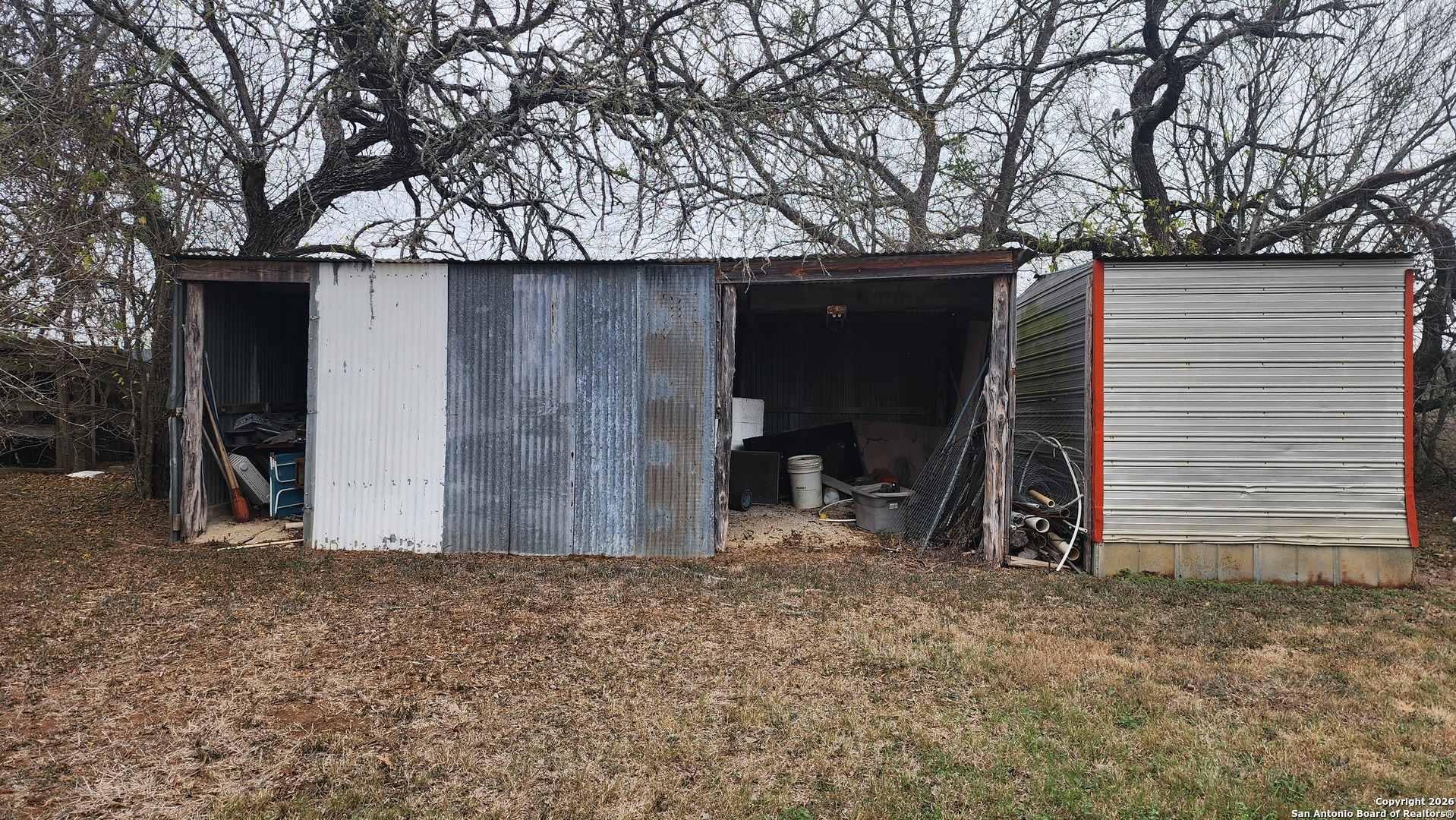 449 Hurst Lane Seguin, TX 78155 - Photo 13 of 28 a view of a barn in the back yard