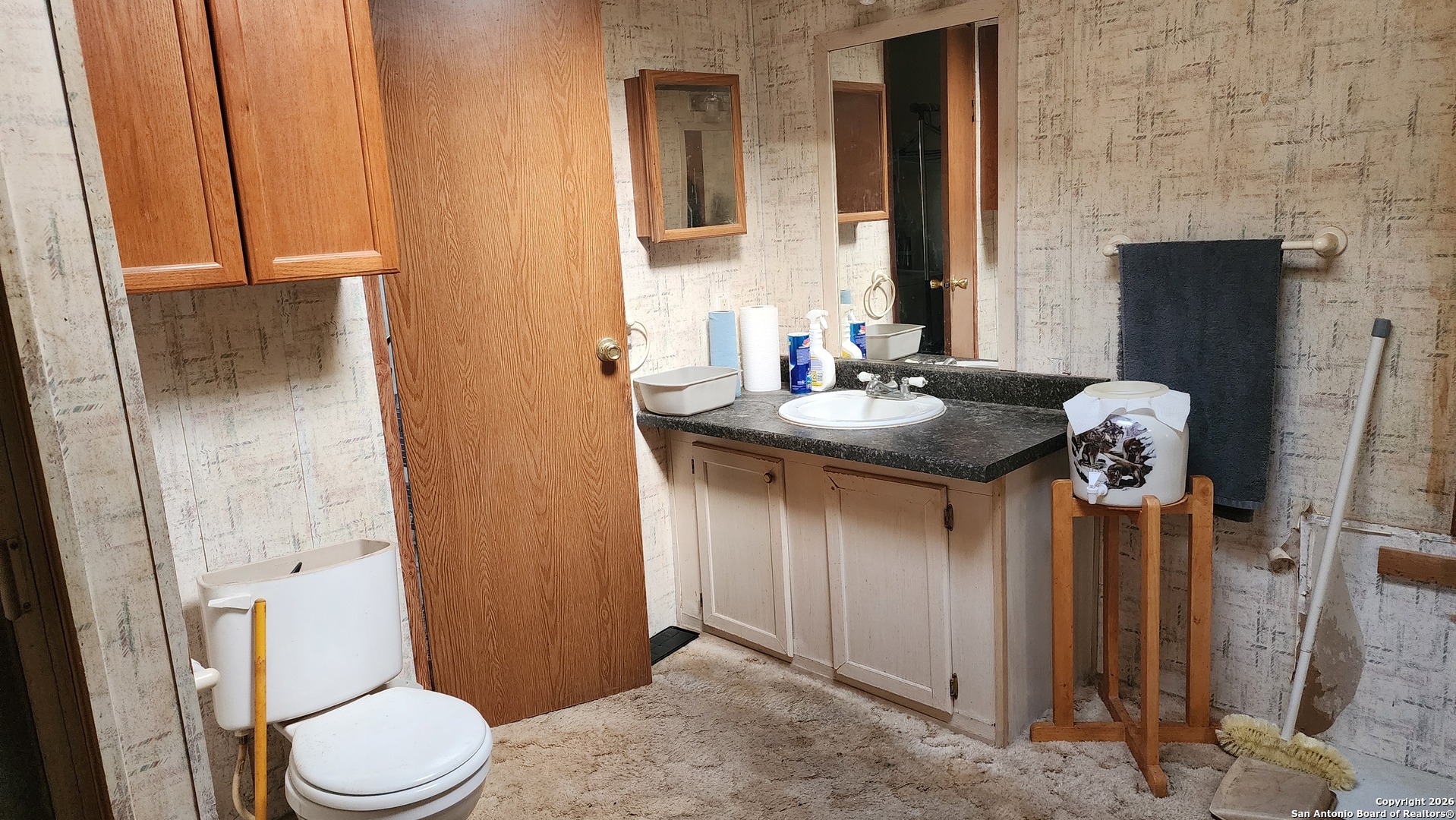 449 Hurst Lane Seguin, TX 78155 - Photo 25 of 28 a bathroom with a granite countertop sink toilet and shower