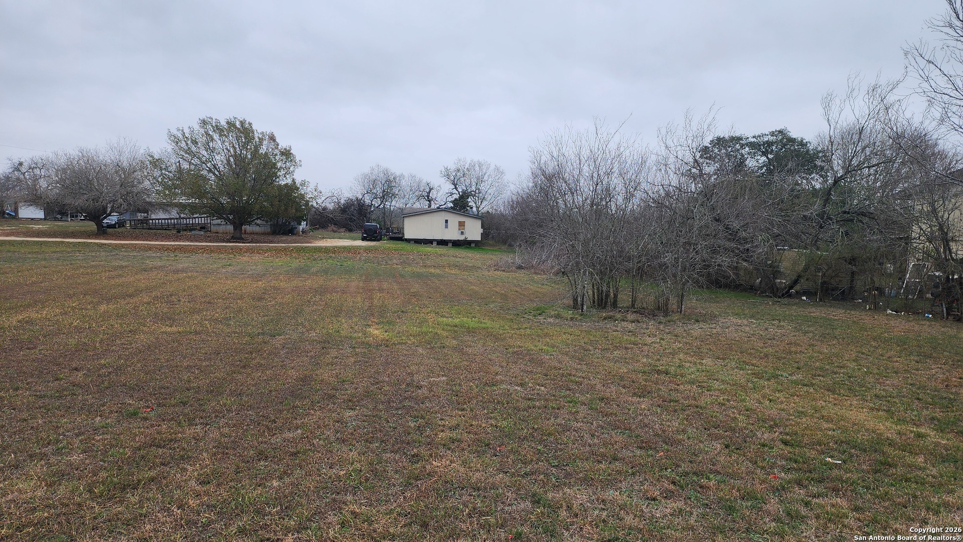 449 Hurst Lane Seguin, TX 78155 - Photo 4 of 28 a view of a field with trees