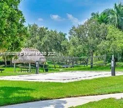 a view of a park with tree s
