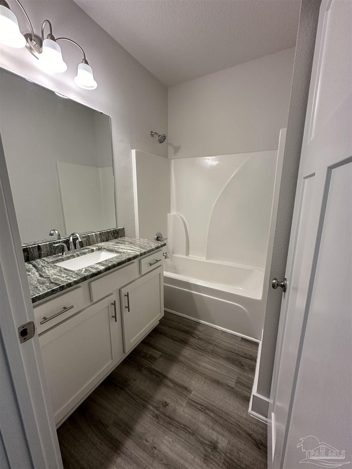 4466 Jude Way Pace, FL 32571 - Photo 21 of 27 Full Bath in Back Hall to Service Bedrooms 2 & 3
