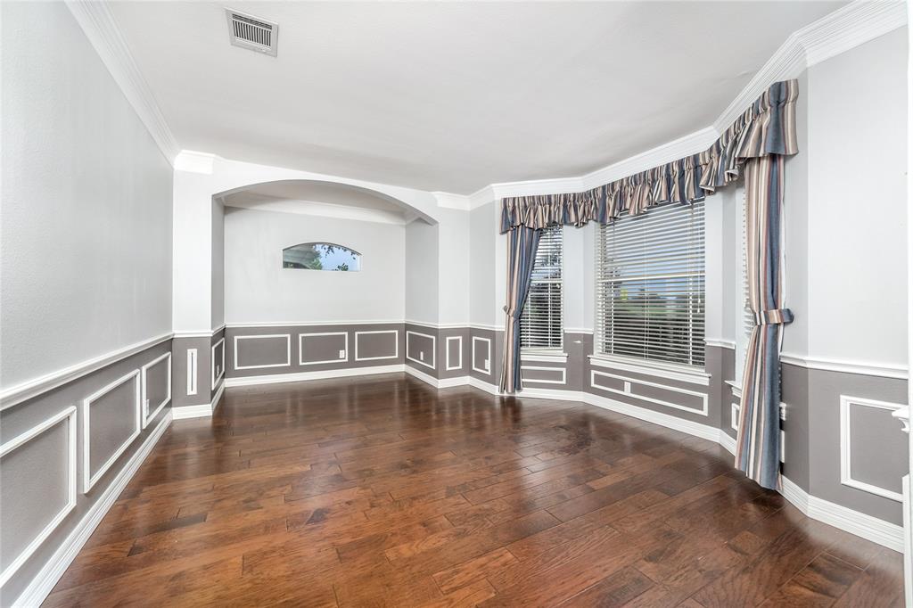 5801 Yeary Road Plano, TX 75093 - Photo 6 of 33 Bay window with horizontal blinds and valance