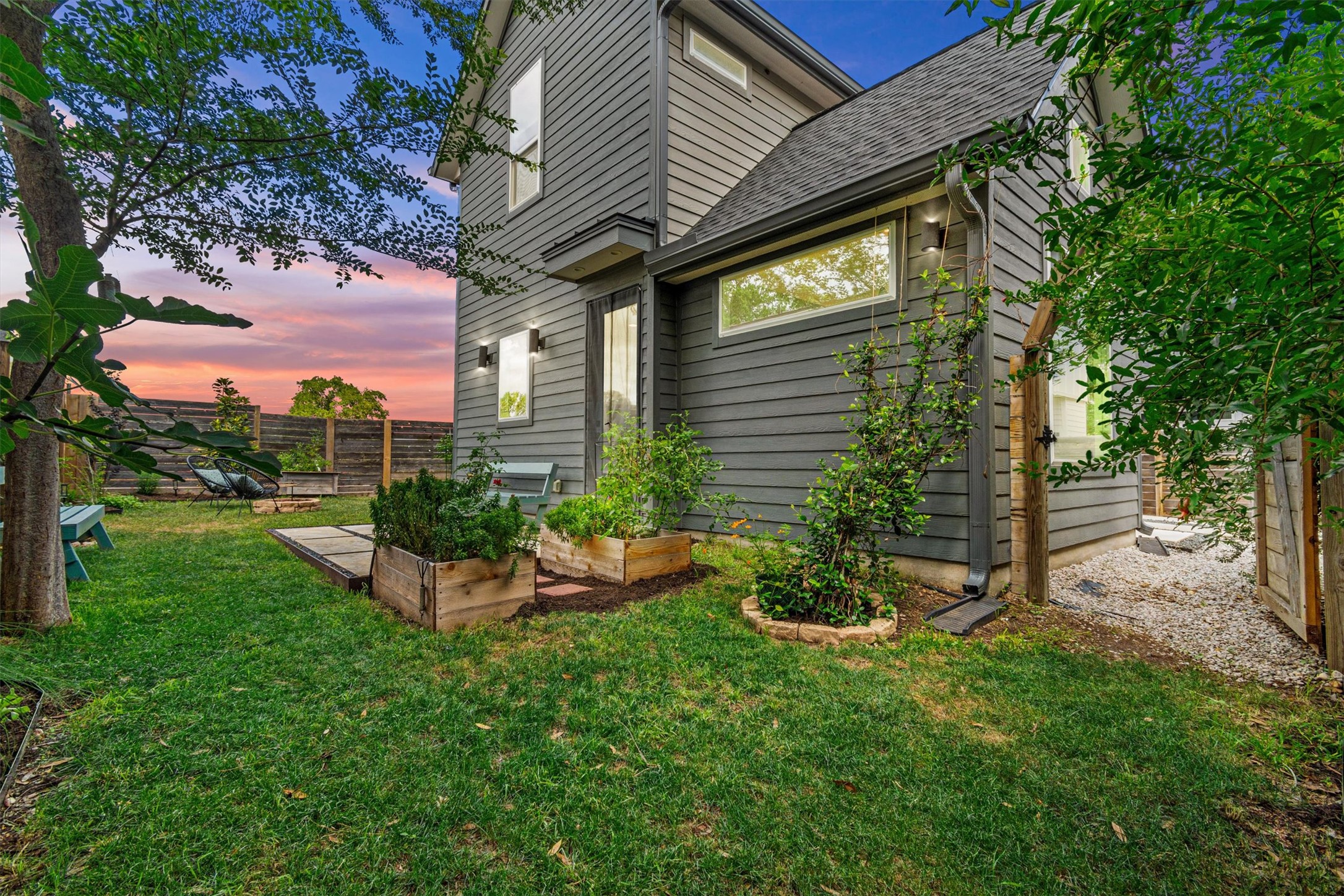 5006 Lott Avenue, Unit 2 Austin, TX 78721 - Photo 1 of 1 Step outside to a fully fenced, beautifully landscaped backyard.