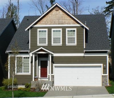 2421 Stafford Way Bothell, WA 98012 - Photo 1 of 1 a front view of a house with garden