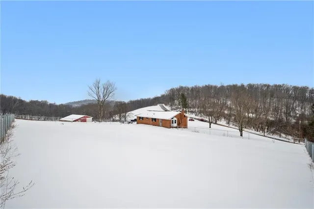 a view of a chair and table in the balcony
