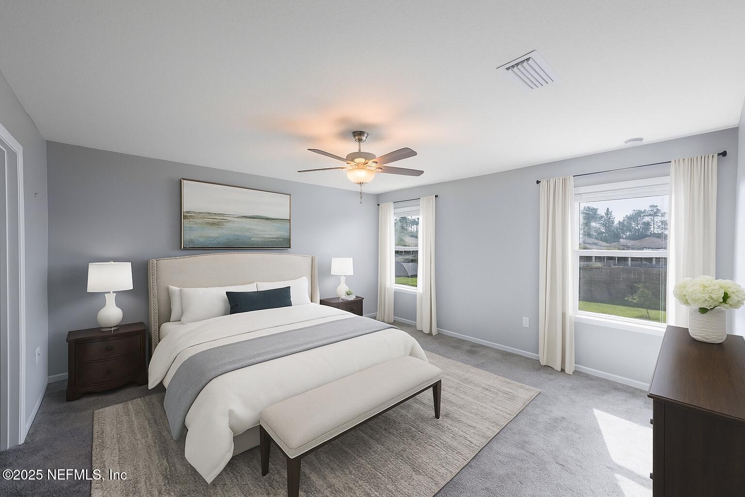 77041 Cobblestone Drive Yulee, FL 32097 - Photo 11 of 23 a bedroom with a large bed and a window