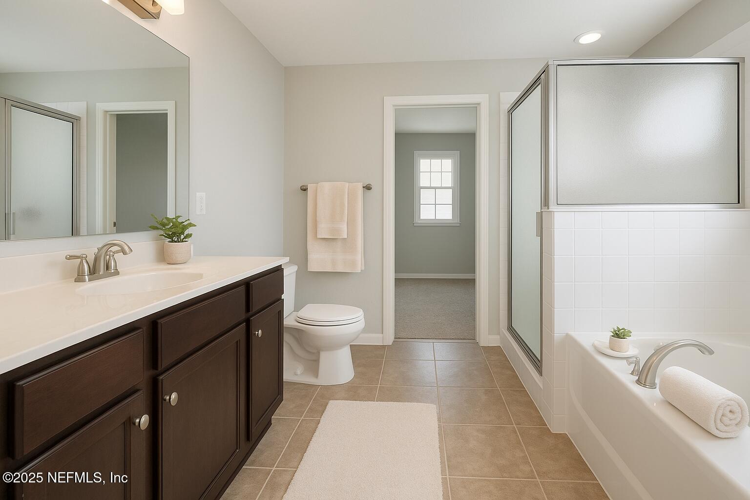 77041 Cobblestone Drive Yulee, FL 32097 - Photo 13 of 23 a bathroom with a sink a toilet and shower