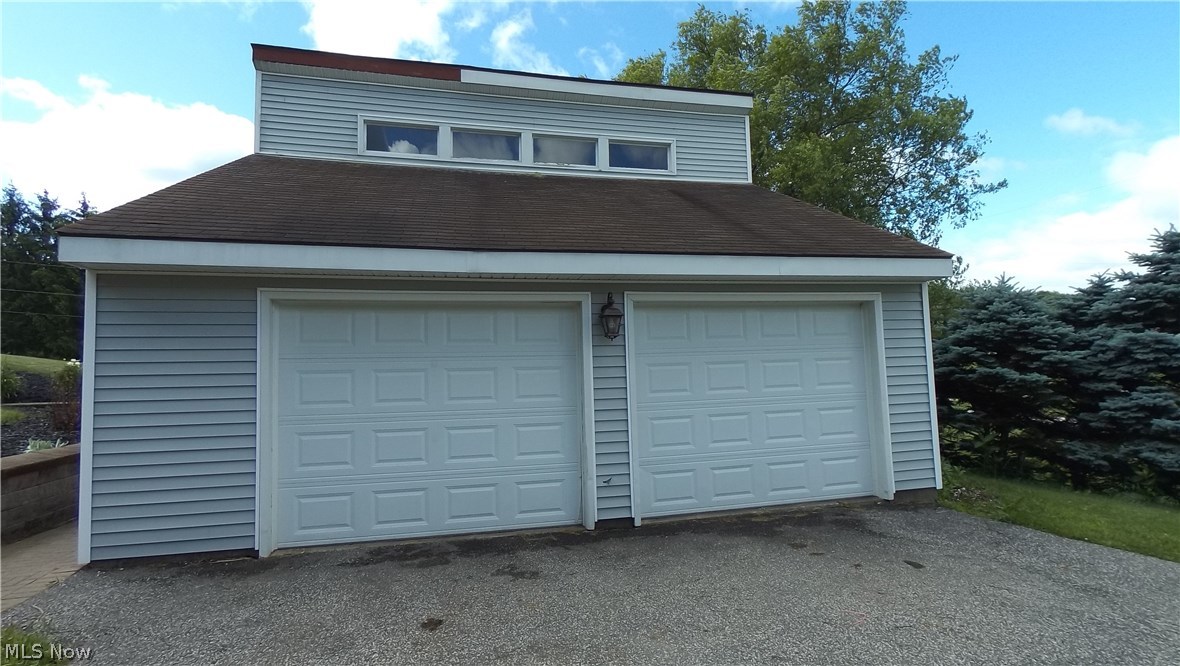 5366 Rootstown Road Ravenna, OH 44266 - Photo 2 of 28 2+car garage with loft space above
