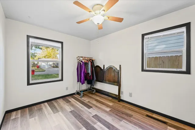 a view of a room with gym equipment and a window