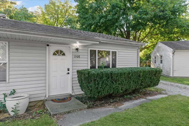 a view of a backyard with plants