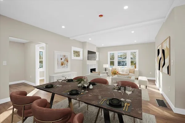 a living room with furniture and a table