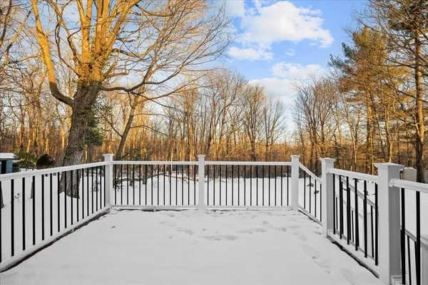 a view of a wooden fence