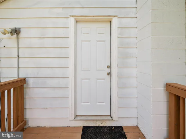 a view of small space with white wooden cabinet